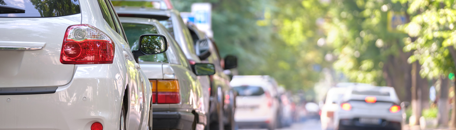 Back view of cars driving in a line Back view of cars driving in a line