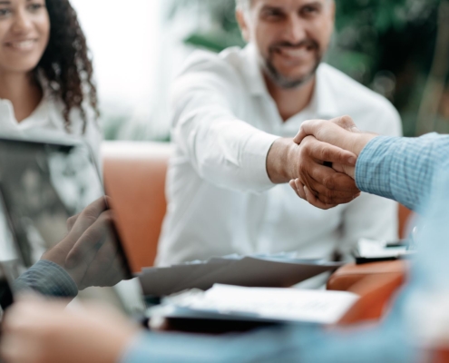 Business people shaking hands
