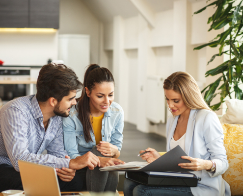 Couple looking at insurance paperwork